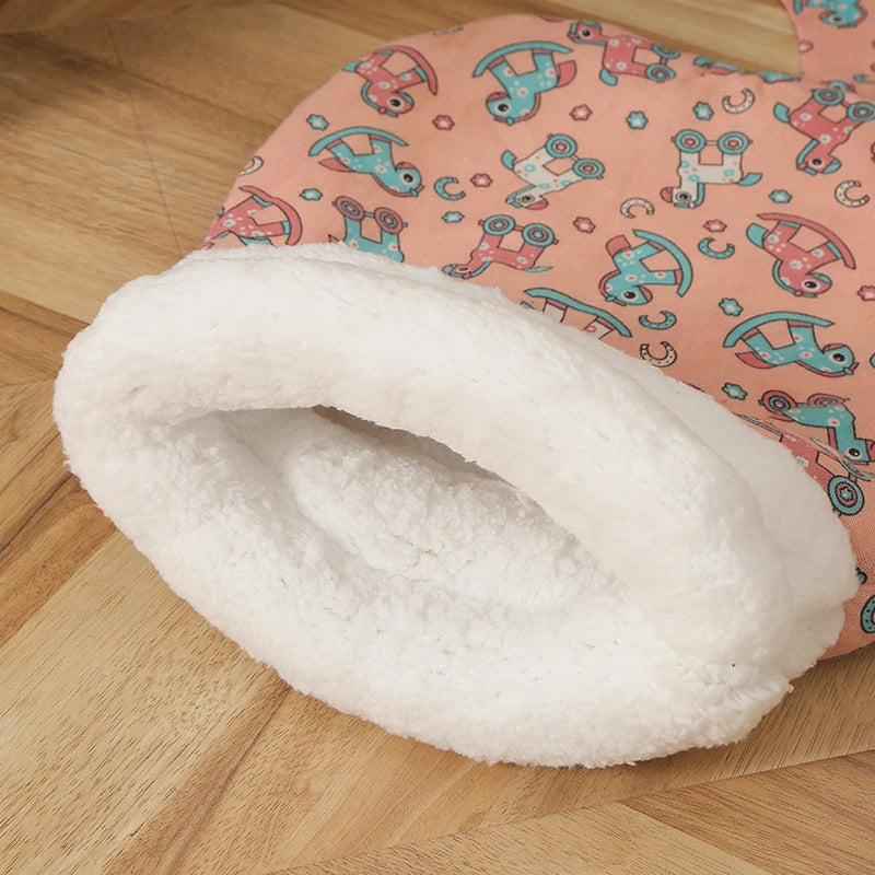 Saco nido rosa estampado con forro de peluche